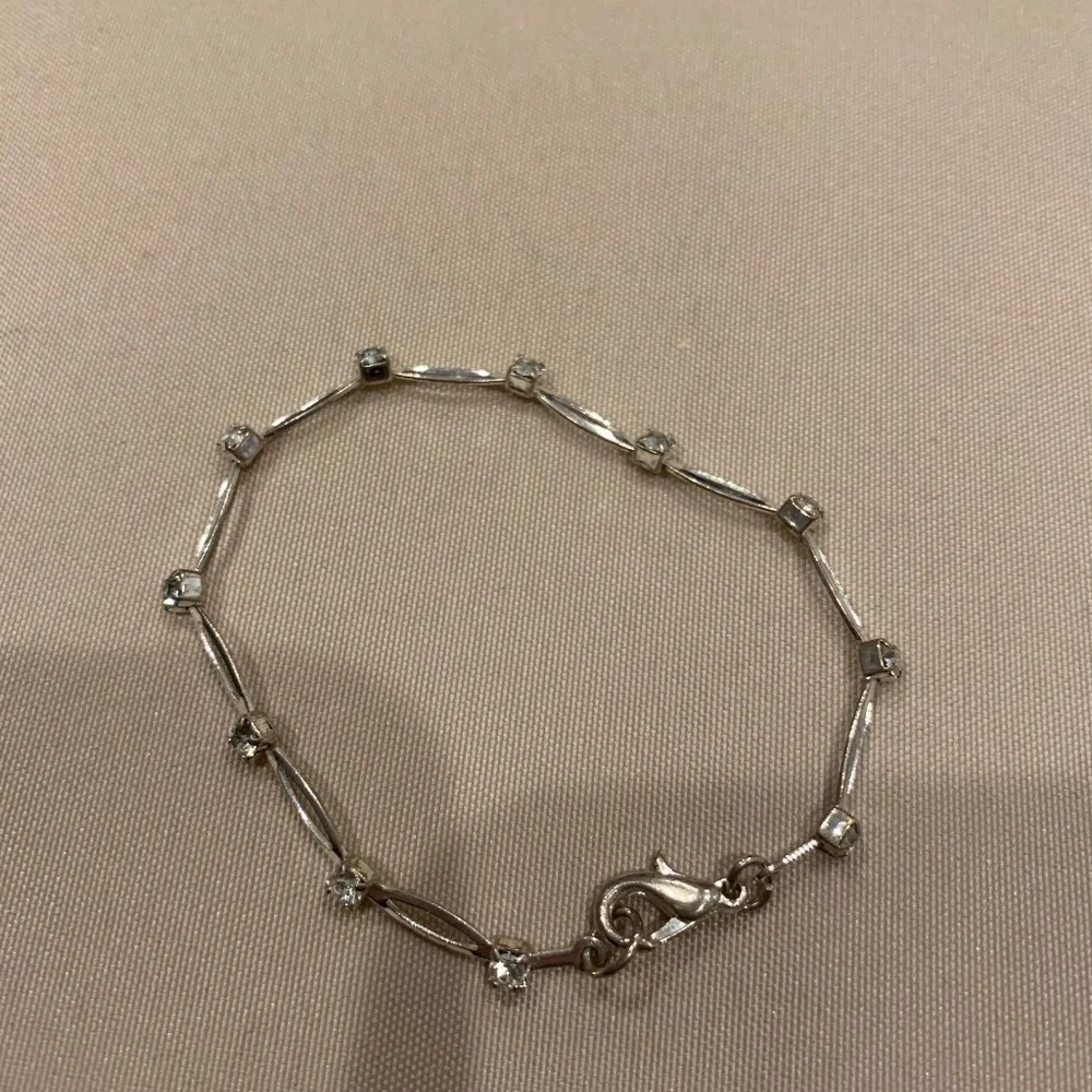 Silvertone Bracelet w/ Small Rhinestones Separated by Oval Shapes  Excellent